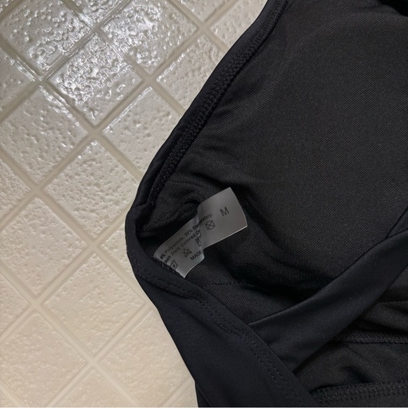 Elerevyo High Neck Ruched Tummy
Control Criss Cross Back Modest Skirt Swimdress - Picture 9 of 9